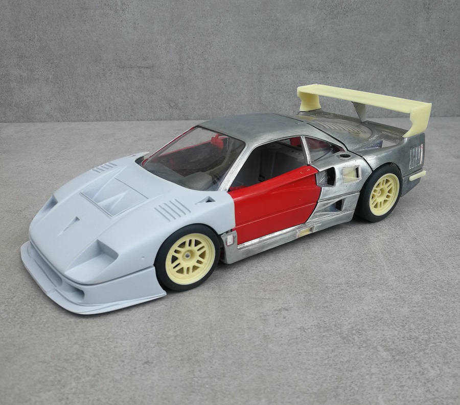 Lot of 3 1/18 scale models. BURAGO, 1 Ferrari F40 from 1…